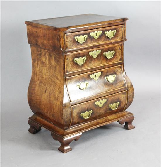 A 19th century Dutch walnut bombe commode, W.2ft D.1ft 5in. H.2ft 8in.